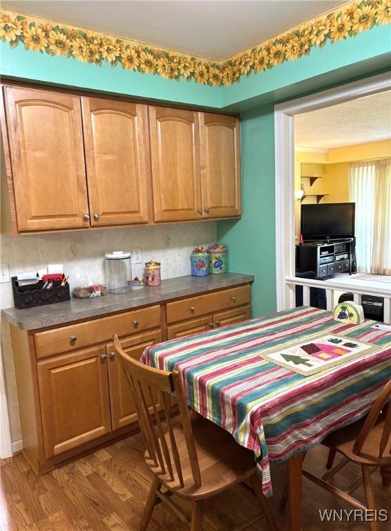 3 Homer Ln Unit B, Amherst, NY 14221 - kitchen featuring light wood-style flooring