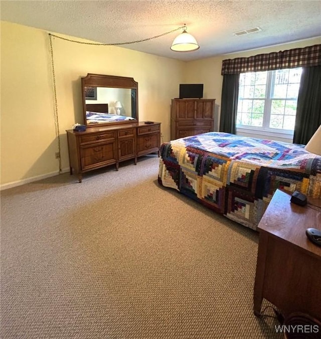 3 Homer Ln Unit B, Amherst, NY 14221 - bedroom with light colored carpet and a textured ceiling