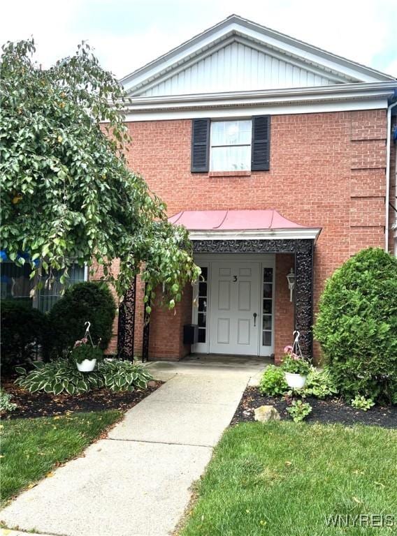 3 Homer Ln Unit B, Amherst, NY 14221 - view of front of home with brick siding