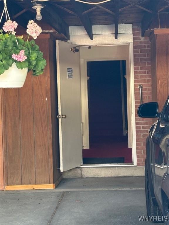 3 Homer Ln Unit B, Amherst, NY 14221 - property entrance featuring brick siding