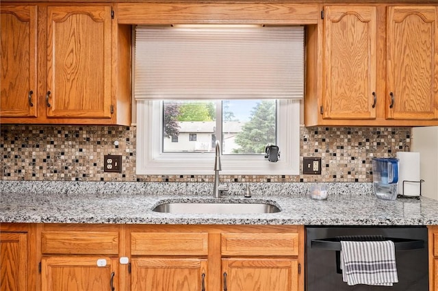 73 Hazel Bark Run, Gates, NY 14606 - kitchen featuring dishwasher, backsplash, and light stone counters