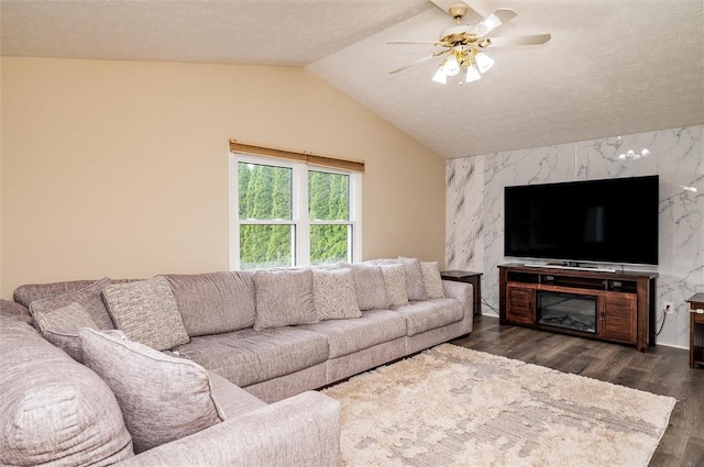 73 Hazel Bark Run, Gates, NY 14606 - living room featuring dark wood-type flooring, lofted ceiling, ceiling fan, and an accent wall