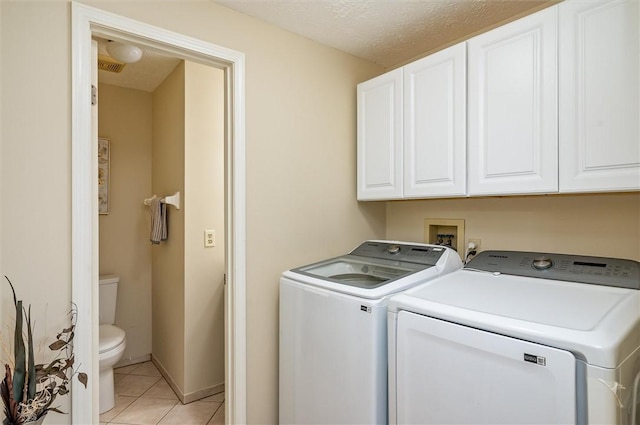 73 Hazel Bark Run, Gates, NY 14606 - laundry room featuring washing machine and clothes dryer and light tile patterned floors