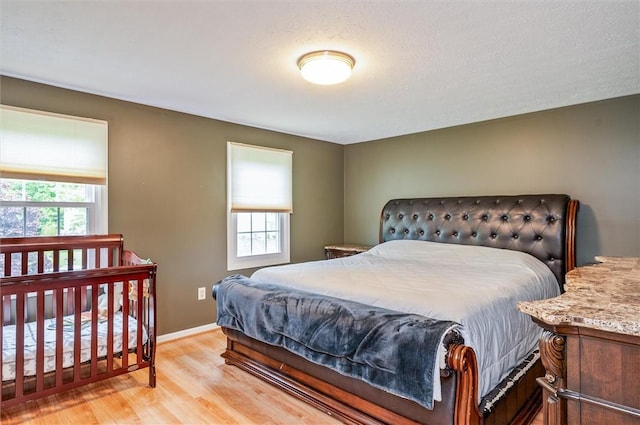 73 Hazel Bark Run, Gates, NY 14606 - bedroom with wood finished floors and baseboards