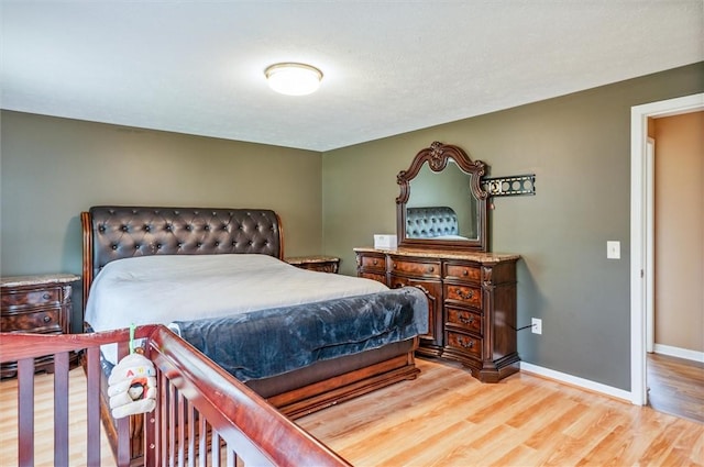 73 Hazel Bark Run, Gates, NY 14606 - bedroom with light wood-type flooring and baseboards