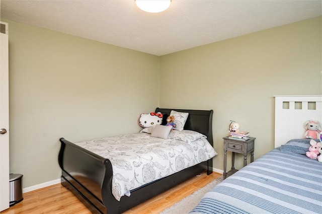 73 Hazel Bark Run, Gates, NY 14606 - bedroom with light wood finished floors