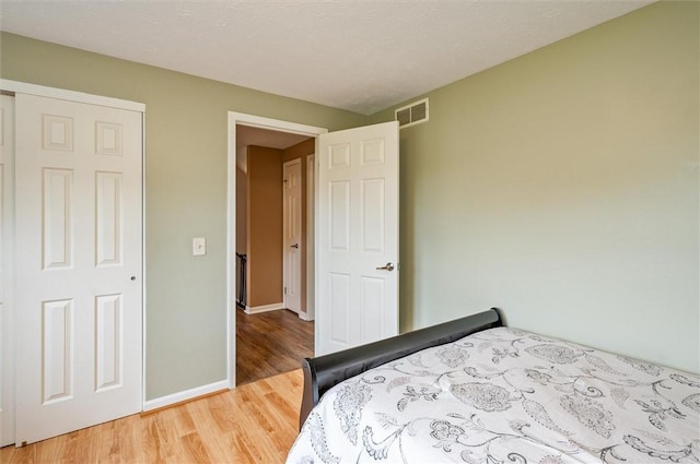 73 Hazel Bark Run, Gates, NY 14606 - bedroom featuring light wood finished floors and baseboards