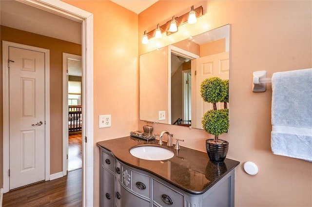 73 Hazel Bark Run, Gates, NY 14606 - bathroom featuring wood finished floors and vanity