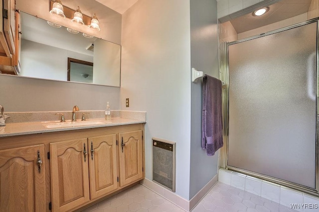 79 Pin Oak Cir, Grand Island, NY 14072 - bathroom with tile patterned flooring, a shower with shower door, and vanity