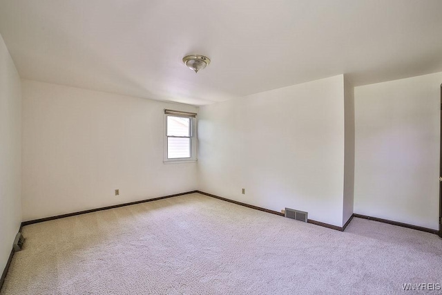 79 Pin Oak Cir, Grand Island, NY 14072 - carpeted empty room featuring baseboards