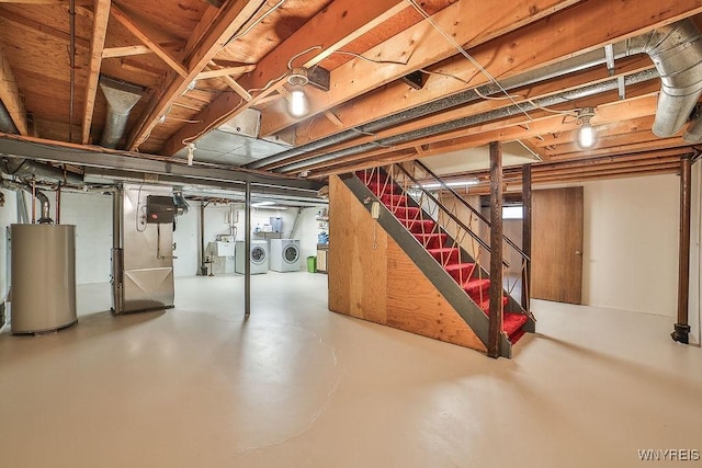 79 Pin Oak Cir, Grand Island, NY 14072 - basement featuring water heater, washer and clothes dryer, stairs, and heating unit