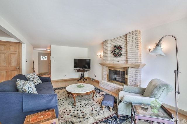 79 Pin Oak Cir, Grand Island, NY 14072 - living area with wood finished floors and a fireplace