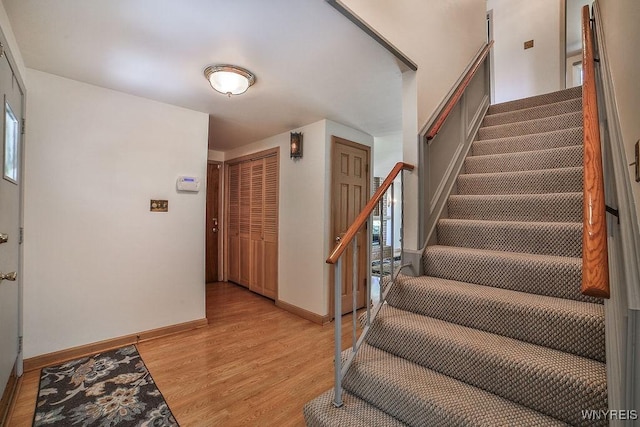 79 Pin Oak Cir, Grand Island, NY 14072 - entryway with stairway and light wood finished floors