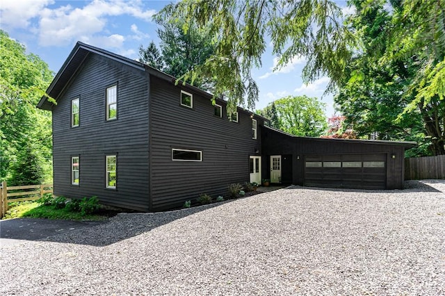 2465 Turk Hill Rd, Perinton, NY 14564 - view of front of house with a garage and driveway