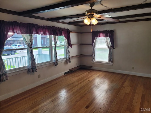 15 Beaver St, Manheim, NY 13329 - unfurnished room with healthy amount of natural light, beamed ceiling, wood-type flooring, and ceiling fan