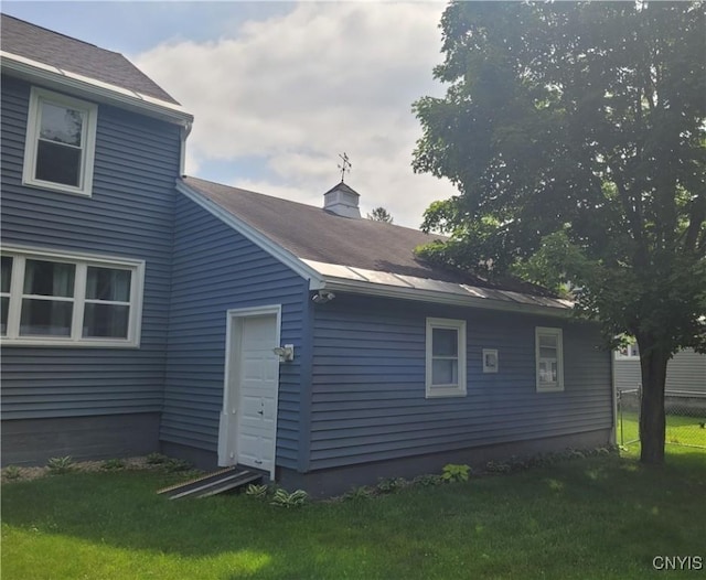 15 Beaver St, Manheim, NY 13329 - back of house featuring a chimney