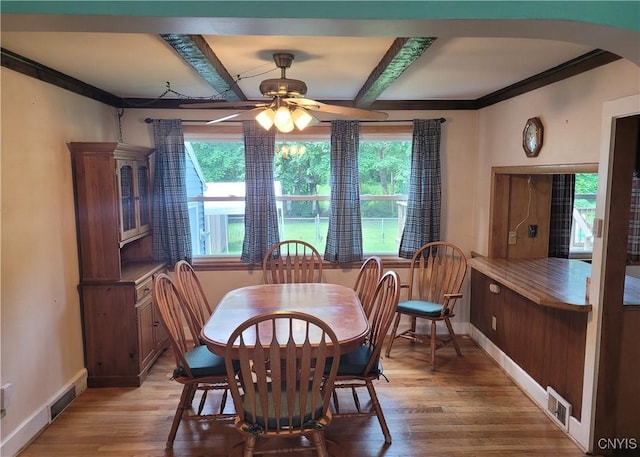 15 Beaver St, Manheim, NY 13329 - dining room with ceiling fan, light wood-style flooring, beamed ceiling, and arched walkways