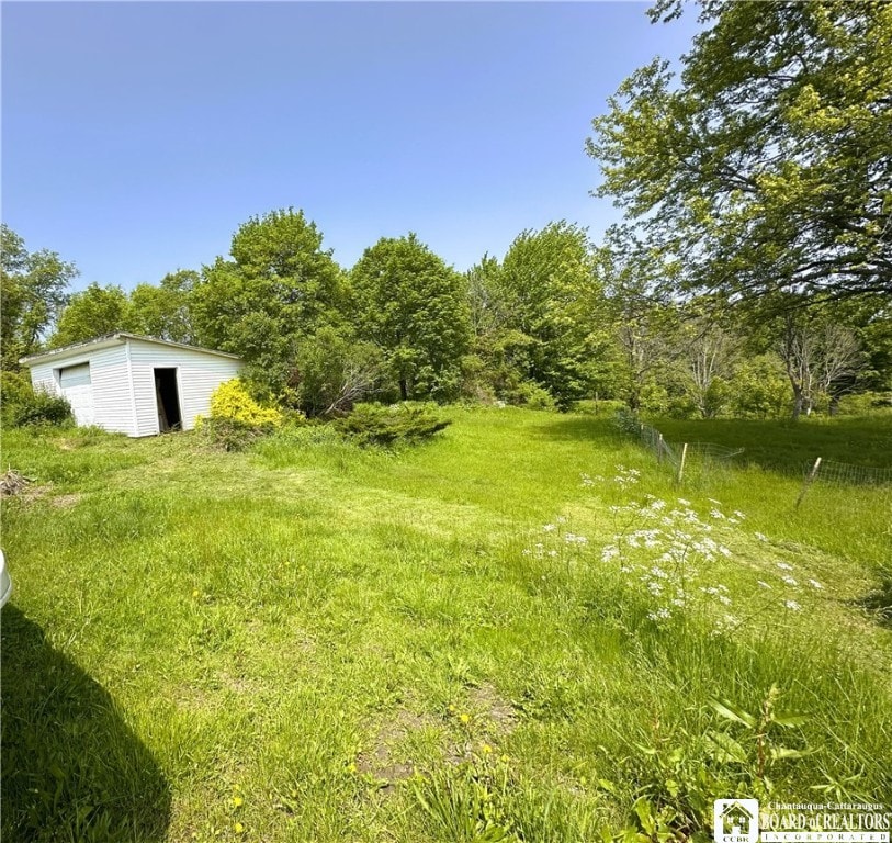 3213 Rte 394, North Harmony, NY 14710 - view of yard with a garage and an outdoor structure