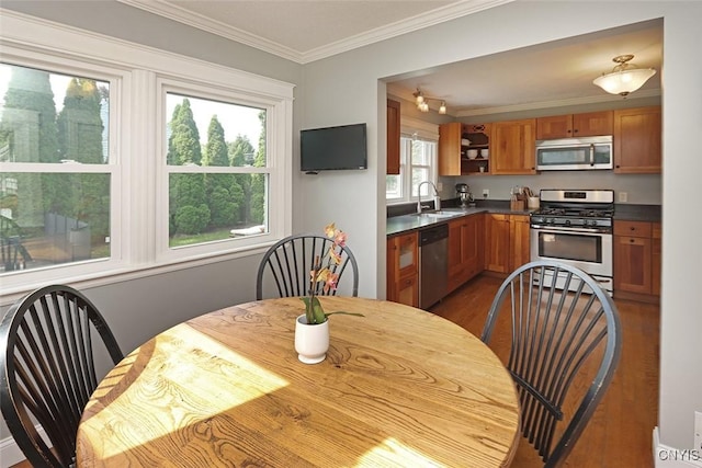 105 Maple Dr, Dewitt, NY 13066 - dining space with ornamental molding and dark wood-style floors