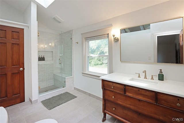 105 Maple Dr, Dewitt, NY 13066 - bathroom with vanity, a stall shower, and tile patterned floors