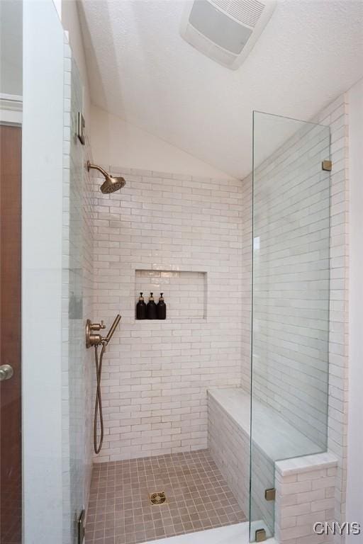 105 Maple Dr, Dewitt, NY 13066 - bathroom with vaulted ceiling and a stall shower