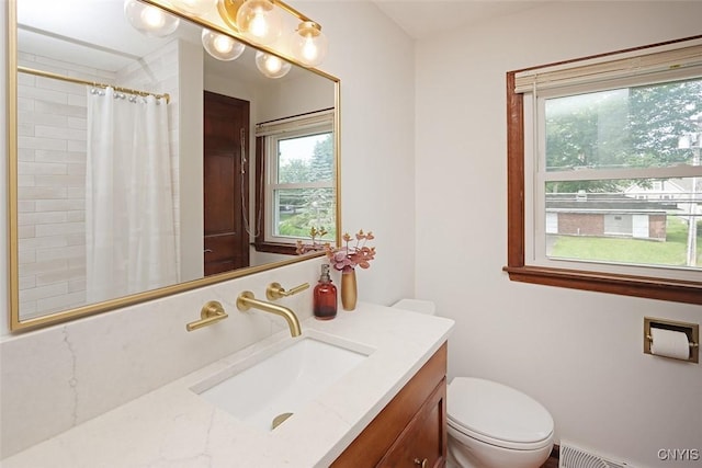 105 Maple Dr, Dewitt, NY 13066 - full bath featuring plenty of natural light, vanity, a shower with curtain, and a baseboard radiator