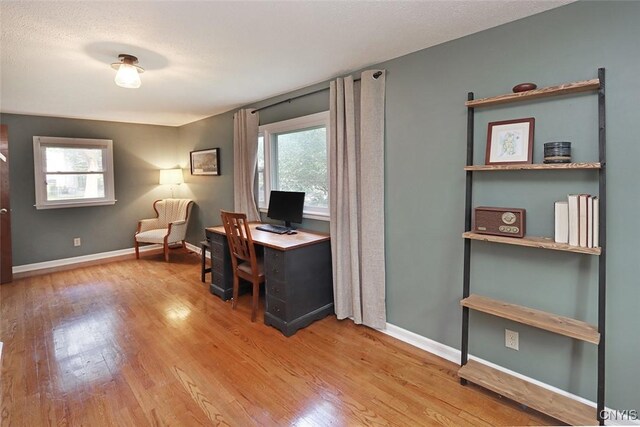 105 Maple Dr, Dewitt, NY 13066 - home office with wood finished floors and baseboards