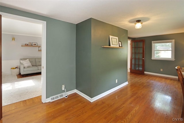 105 Maple Dr, Dewitt, NY 13066 - unfurnished room with wood finished floors and baseboards