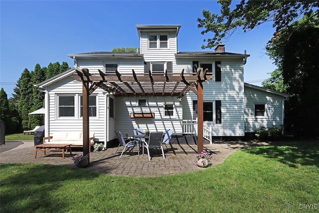 105 Maple Dr, Dewitt, NY 13066 - back of house featuring a pergola, a patio, a lawn, and a chimney