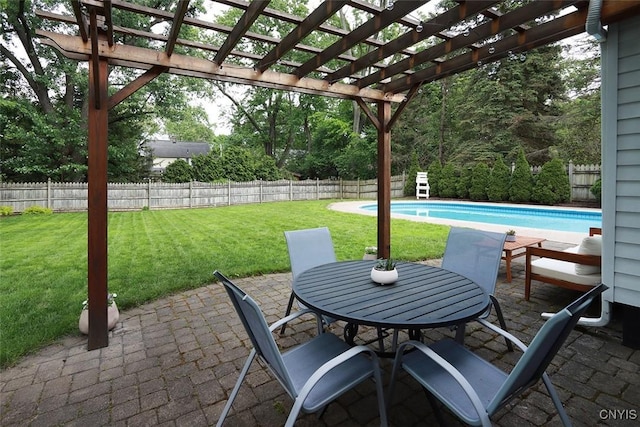 105 Maple Dr, Dewitt, NY 13066 - fenced backyard featuring a pergola, a patio, and outdoor dining area