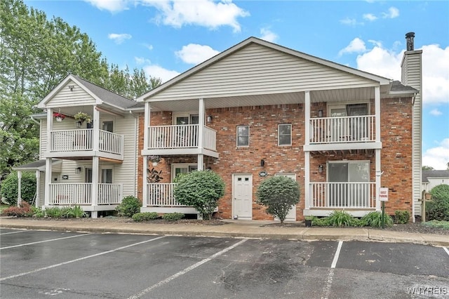 4623 Chestnut Ridge Rd Unit A, Amherst, NY 14228 - view of building exterior with uncovered parking