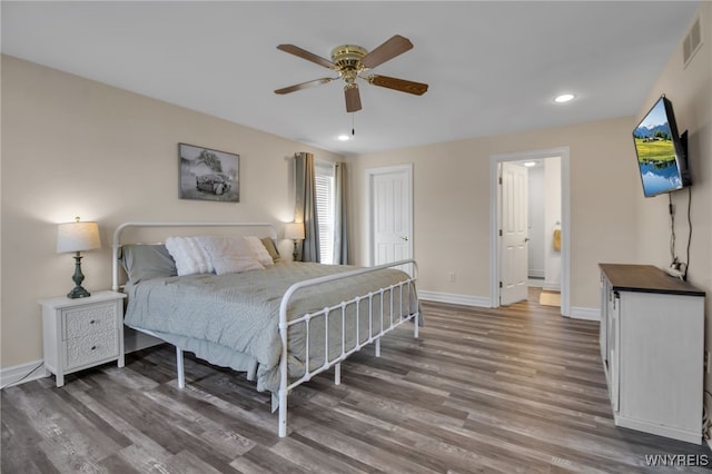 3866 Stone Ridge Rd, Wheatfield, NY 14120 - bedroom featuring wood finished floors, recessed lighting, connected bathroom, ceiling fan, and a closet