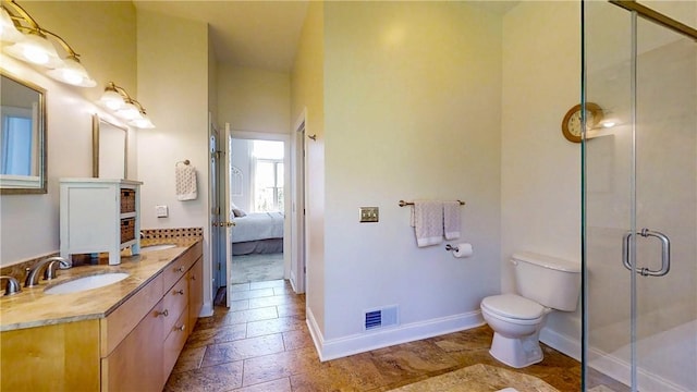 3409 Fieldstone Ln, Erwin, NY 14870 - ensuite bathroom featuring vanity, a shower stall, and stone tile floors