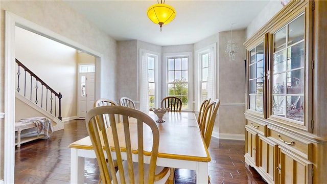 3409 Fieldstone Ln, Erwin, NY 14870 - dining room with dark wood-type flooring, plenty of natural light, and stairs