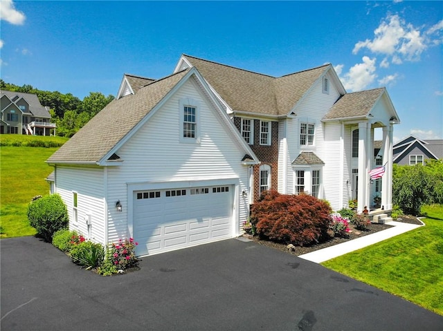 3409 Fieldstone Ln, Erwin, NY 14870 - traditional-style home with driveway, a front lawn, and a shingled roof