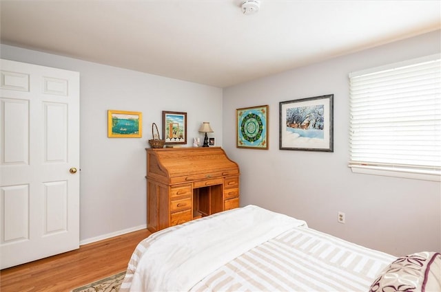11 Keystone Ct, Sweden, NY 14420 - bedroom featuring wood finished floors and baseboards