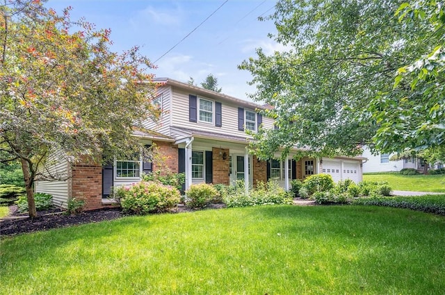 11 Keystone Ct, Sweden, NY 14420 - traditional-style home with brick siding, a front yard, and a garage