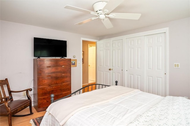 11 Keystone Ct, Sweden, NY 14420 - bedroom featuring light wood-type flooring, two closets, and ceiling fan
