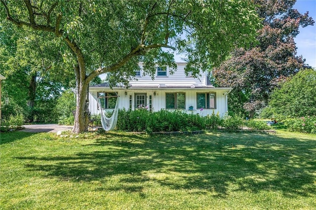 1463 Lehigh Station Rd, Henrietta, NY 14467 - view of front of property featuring a front yard and board and batten siding