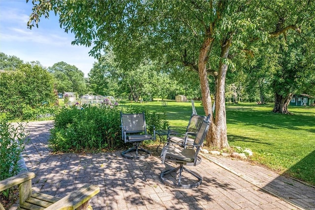 1463 Lehigh Station Rd, Henrietta, NY 14467 - view of patio / terrace featuring view of scattered trees