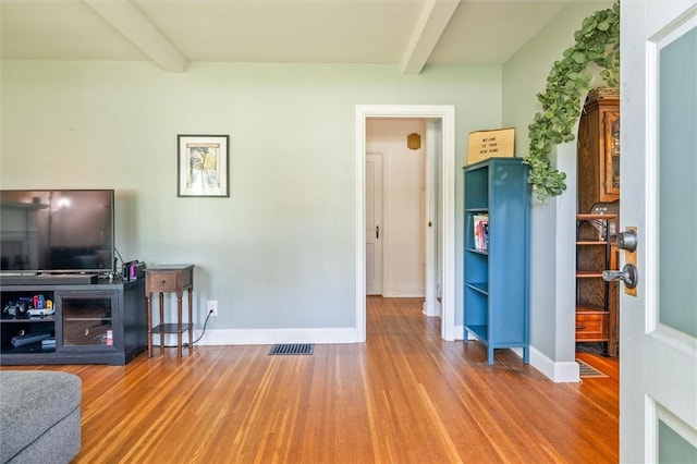1463 Lehigh Station Rd, Henrietta, NY 14467 - living area with beamed ceiling and wood finished floors