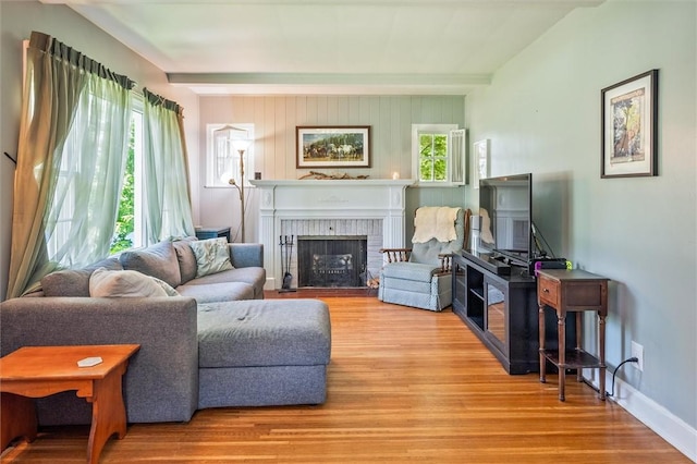 1463 Lehigh Station Rd, Henrietta, NY 14467 - living area featuring wood finished floors and a fireplace