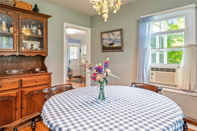 1463 Lehigh Station Rd, Henrietta, NY 14467 - dining space featuring a chandelier