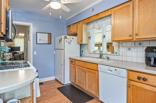 1463 Lehigh Station Rd, Henrietta, NY 14467 - kitchen featuring white appliances, a ceiling fan, decorative backsplash, and light countertops