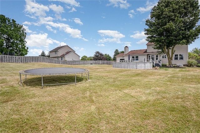 3487 Scenic Way, Walworth, NY 14502 - fenced backyard featuring a trampoline
