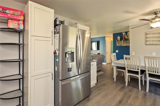 363 Kartes Dr, Greece, NY 14616 - kitchen featuring stainless steel fridge, ceiling fan, wood finished floors, and white cabinetry