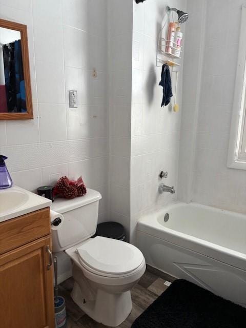 146 Delamaine Dr, Rochester, NY 14621 - bathroom featuring vanity, tile walls, and  shower combination