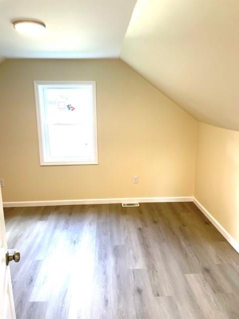 508 Baylor Rd, Elmira-City, NY 14904 - bonus room featuring lofted ceiling and wood finished floors