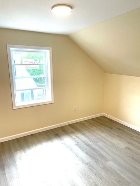 508 Baylor Rd, Elmira-City, NY 14904 - bonus room featuring wood finished floors and vaulted ceiling