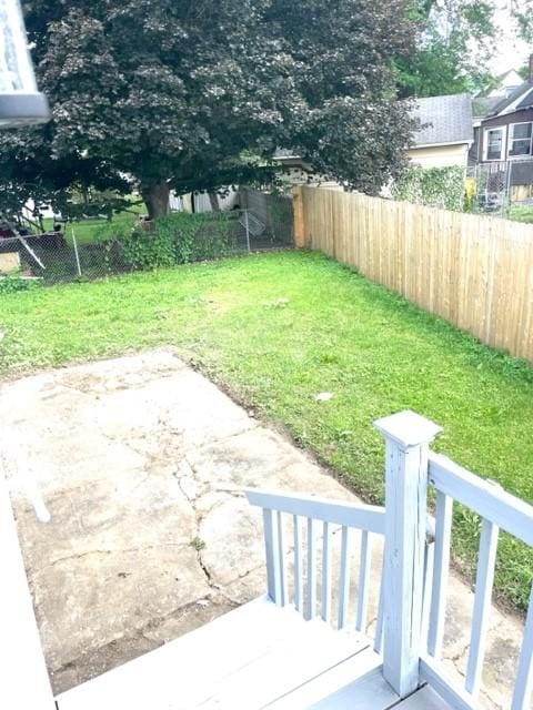 508 Baylor Rd, Elmira-City, NY 14904 - fenced backyard with a patio area